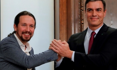 Iglesias (izq.) junto a Sánchez, artífices de la alianza que gobernará el país europeo. (Reuter)