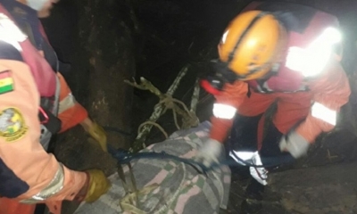 Tres personas que visitaban las cascadas del El Tunqui