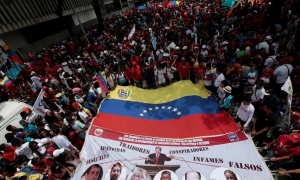 Ciudadanos en apoyo de Nicolas Maduro (Marco Bello / Reuters)