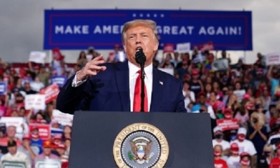 Donald Trump espera inmunizar a todos los estadounidenses para abril del próximo año. | Fuente: AFP
