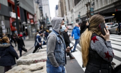 Personas con tapabocas para evitar contraer Coronavirus. Foto: La Nación.