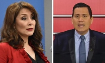 La ministra de Comunicación, Isabel Fernández, y el periodista de Gigavisión, Junior Arias.