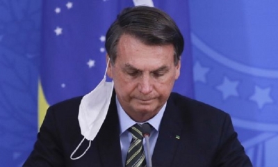 Jair Bolsonaro durante una conferencia de prensa en marzo de este año. | Fuente: AFP