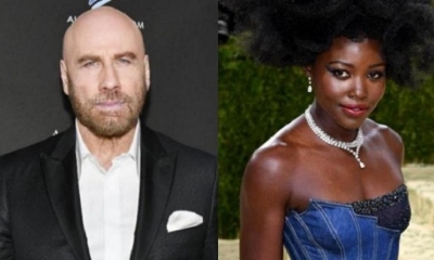 Los actores John Travolta y Lupita Nyongo