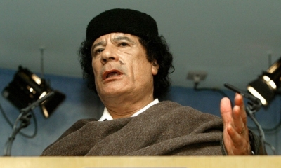 Muammar Gaddafi.