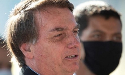 Bolsonaro, uno de los mandatarios más negacionistas del virus y su gravedad, ha circulado a menudo por Brasilia sin la máscarillas. | Fuente: EFE