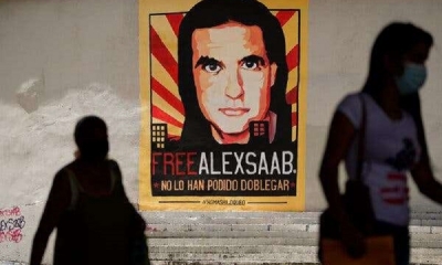 Un afiche con el rostro de Álex Saab, Empresario Colombiano detenido en Cabo Verde.