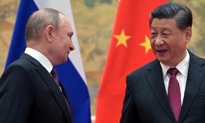 Vladimir Putin, con el jefe de estado chino, Xi Jinping