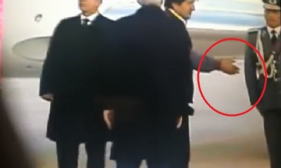 Morales, saluda al militar antes que al vicepresidente/Foto. Captura de pantalla