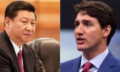 El presidente de China, Xi Jinping, y el primer ministro canadiense Justin Trudeau. | Fuente: Foto: AFP/AFP