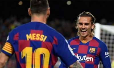 Antoine Griezmann y Lionel Messi. | Fuente: AFP