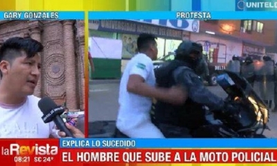 Hombre que sube a moto policial explicó que lo trasladaron a recuperar sus cosas.