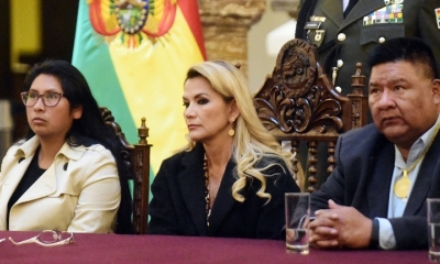 Eva Copa, Jeanine Añez y Sergio Choque, durante un acto de promulgación. ABI