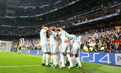 Los jugadores del Real Madrid celebran el gol de Benzema. / Catherine Ivill (Getty Images)
