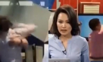 Mientras la presentadora daba un informe, sus colegas empezaron a darse manotazos.