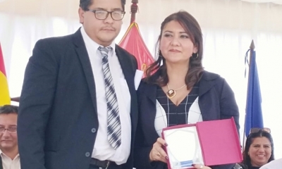 Carlos Morón, agente distrital  y la doctora Silvia Gallegos/Foto. CNS