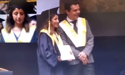 La joven profesional recibiendo su título profesional/Foto. Captura de pantalla
