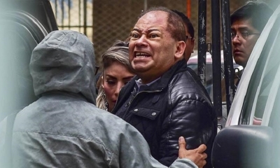 El exministro de Gobierno Carlos Romero, ayer durante su traslado a la Fiscalía. | APG