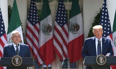 Andrés Manuel López Obrador y Donald Trump, en Casa Blanca. / AFP