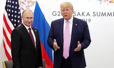 Vladímir Putin (izq,) y Donald Trump, ayer. | EFE