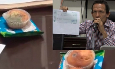 José Luis García muestra el comprobante del pago de la multa/Foto.  Gentileza Gamy