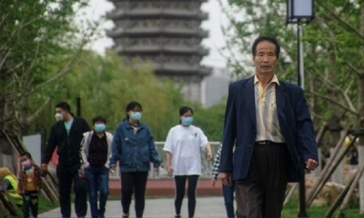 Ciudadanos en un parque de Pekín, China. | Fuente: EFE | Fotógrafo: Wu Hong