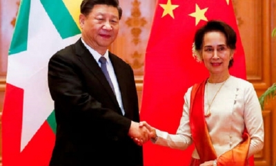 Xi Jinping con Aang Su Suu Kyi. | Fuente: AFP | Fotógrafo: NYEIN CHAN NAING