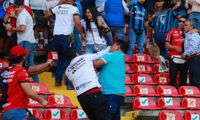 Aficionados de Querétaro y Atlas se enfrentan al minuto 62, donde familias tuvieron que ser resguardadas en la cancha