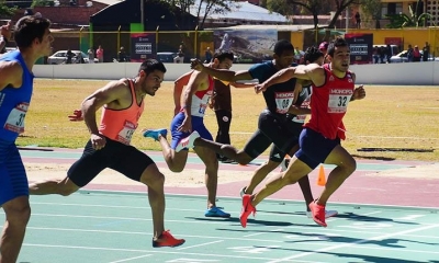 Enrique Polanco (der.), ganador de los 100 mp/Foto. Daniel James
